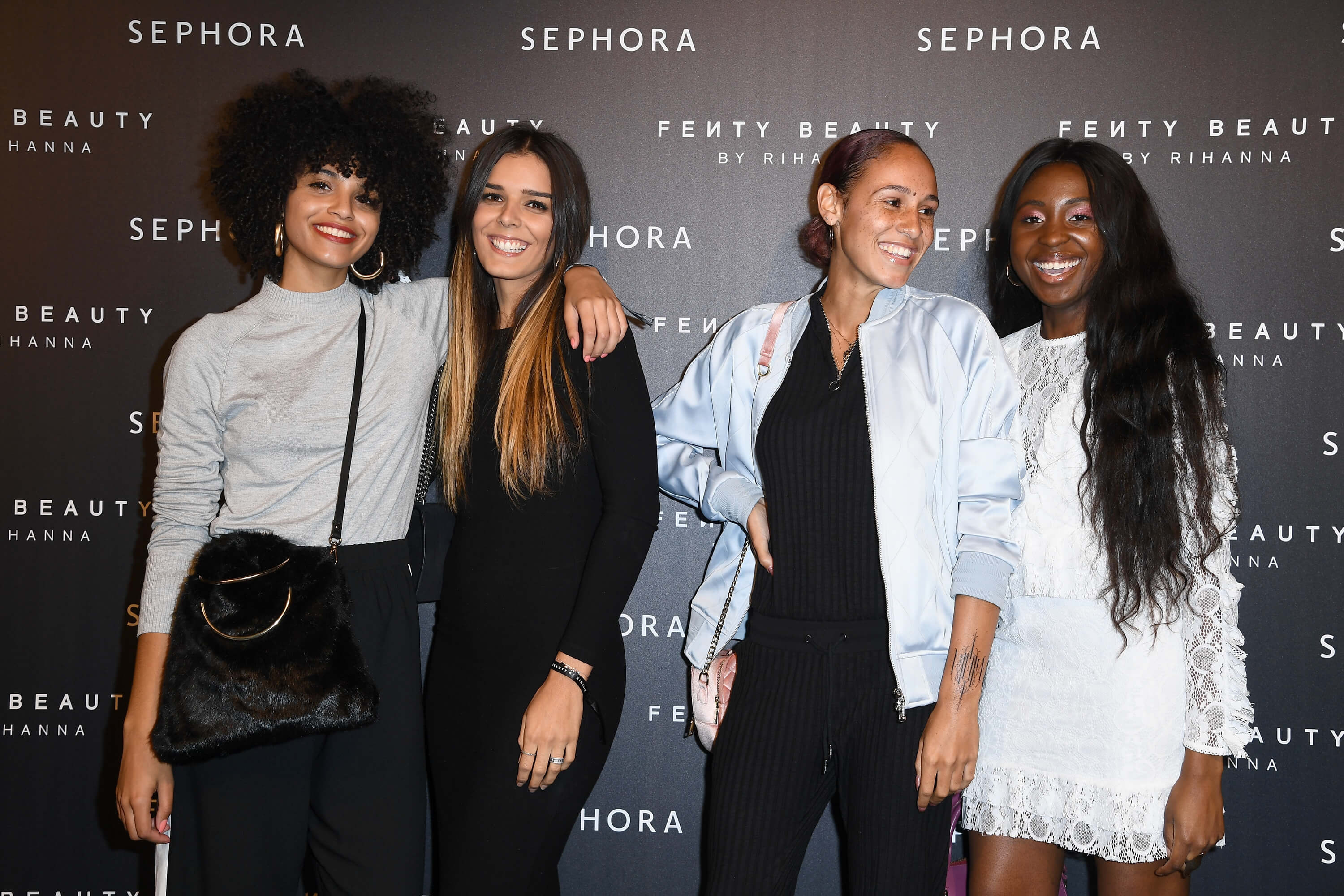 PARIS, FRANCE - SEPTEMBER 21:  (L-R)  Influencers Syanafromparis, Justinevrgr,  Herapradel and Signecatseyes  attend the Fenty Beauty By Rihanna Paris Launch Party hosted by Sephora at Jardin des Tuileries on September 21, 2017 in Paris, France.  (Photo by Pascal Le Segretain/Getty Images for Fenty Beauty) *** Local Caption *** Syanafromparis; Justinevrgr; Herapradel; Signecatseyes